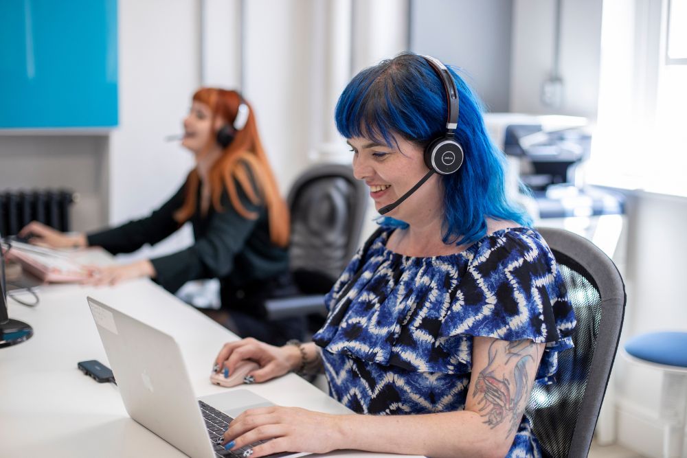 Friendly customer support representative with headset