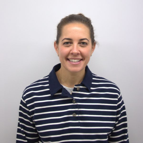 Headshot of Sophie wearing a striped top